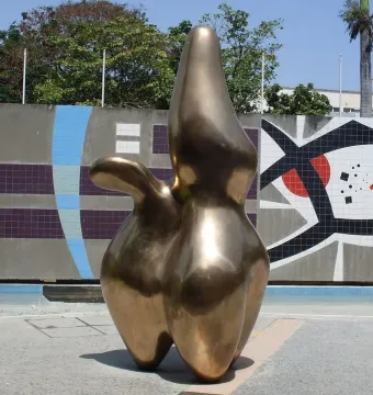 Cloud Shepherd, a bronze-colored abstract sculpture with rounded organic forms and upward-reaching projections.