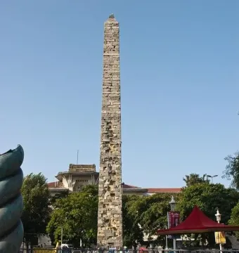The Serpent Column standing tall against a clear blue sky.