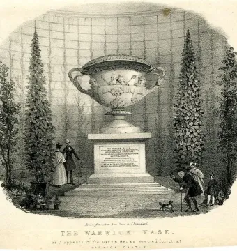 The Warwick Vase displayed on a tall inscribed pedestal in a conservatory, with figures and a small dog at its base.