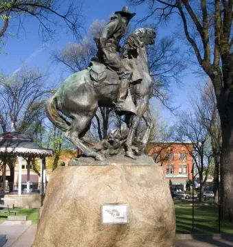 Buckey O\'Neill Monument, a bronze equestrian statue of a man on a rearing horse atop a stone pedestal.