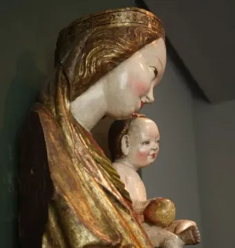 Krużlowa Madonna with a child, wearing a golden crown and robe
