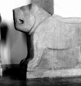 Two ancient stone lion sculptures, one shown frontally with an open mouth and the other in profile.