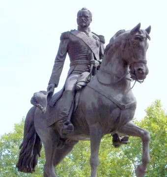General Espartero Monument showing a bronze equestrian statue of a military figure on a horse atop a stone pedestal.