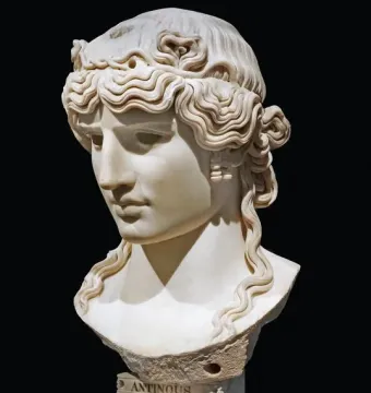 Antinous Mondragone marble bust with wavy hair on a pedestal labeled Antinous and N°126.