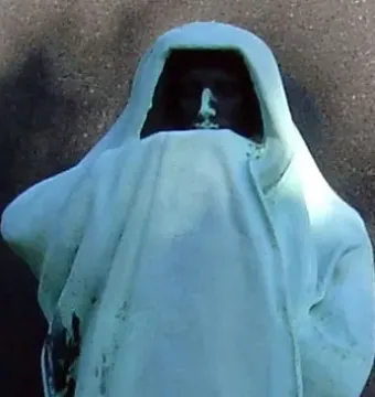 Eternal Silence shows a draped hooded figure with its face in shadow and weathered fabric folds.