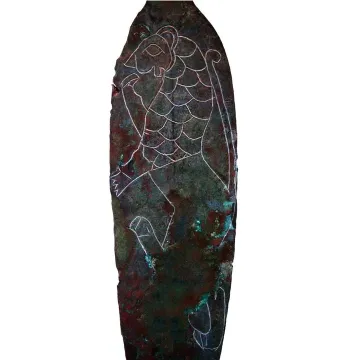 Spear of Lugal with an incised roaring cat-like figure on a corroded dark metal surface.