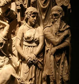 Carved relief on the Portonaccio Sarcophagus showing a draped woman and bearded man among other figures.