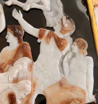 Right section of the Great Cameo of France showing carved relief figures, including an armored central figure and part of an animal.