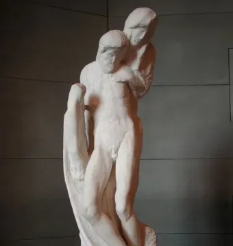 Rondanini Pietà, a tall marble sculpture of two figures in an upright embrace