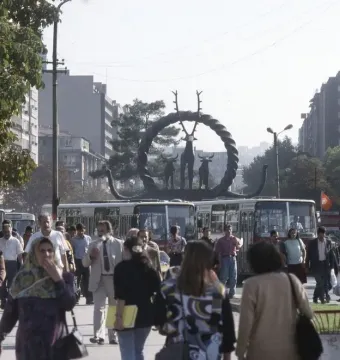 Hittite Sun Disk Monument with deer and bulls in a city street setting
