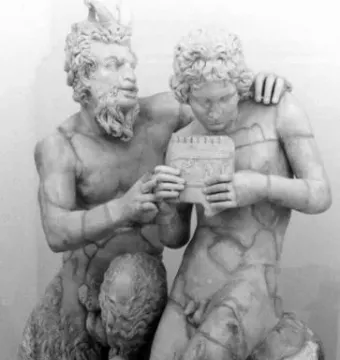 Marble sculpture of Pan and Daphnis, showing a horned, goat-legged figure with his arm around a curly-haired youth as they hold panpipes.