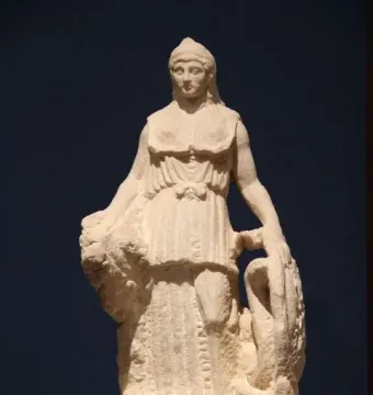 Lenormant Athena, a marble statue of a helmeted draped female figure holding a rounded object and a coiled serpent-like form