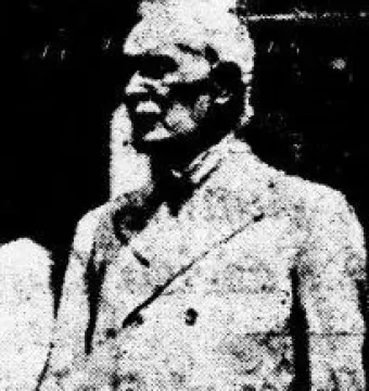 Marble bust of Abraham Lincoln in a double-breasted coat, facing slightly left.