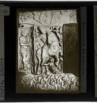 Barberini Ivory panel showing an emperor on horseback with a spear, flanked by figures and topped by winged figures around a bust of Christ.
