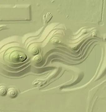 Northumberlandia seen from above as a reclining female landscape sculpture with spiral forms and flowing contours.