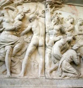 Marble relief from Giovanni delle Bande Nere monument showing classical figures in struggle and supplication.