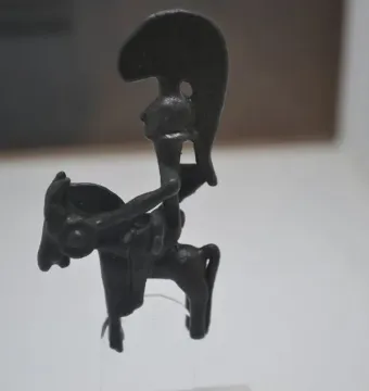 Warrior of Moixent bronze horseman statuette with a crested helmet and round shield.