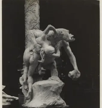 Emmanuel Frémiet\'s Gorilla Carries a Woman sculpture shows an ape-like figure carrying a nude woman over its shoulder.