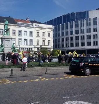 John Cockerill Monument with bronze figures on a stone pedestal in a public square in Brussels