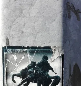 Sticker showing a silhouette of Bohdan Khmelnytsky on horseback with Cyrillic text on a grey surface.