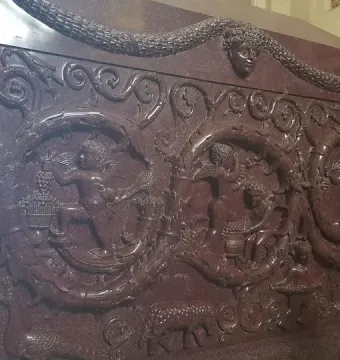 The Sarcophagus of Constantina, a richly carved red porphyry sarcophagus with grapevine reliefs and circular panels of cherubic figures.
