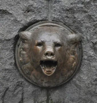 Bronze bear head fountain detail on the Chief Seattle monument pedestal