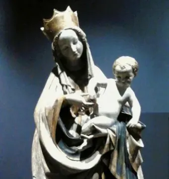 Beautiful Madonna of Wrocław, a crowned woman holding a child with flowing drapery