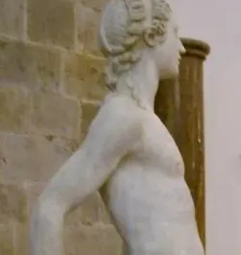 Apollo and Hyacinth marble sculpture showing two nude male figures, one standing and one kneeling.