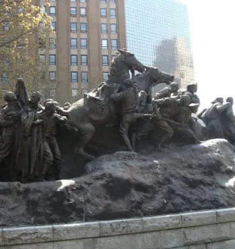 Wars of America bronze sculpture with mounted and foot figures on a dark base