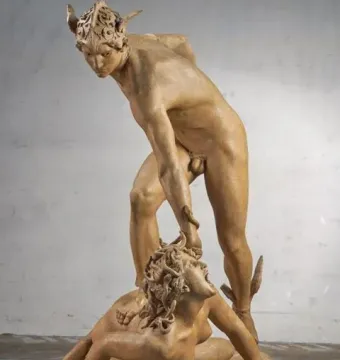 Perseus and the Gorgon sculpture showing a nude Perseus with a winged helmet standing over Medusa.