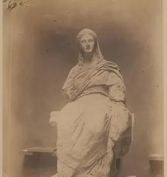 Demeter of Knidos, a seated veiled woman statue with missing forearms.