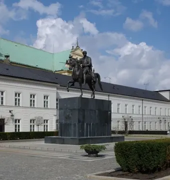 Prince Józef Poniatowski Monument, a bronze equestrian statue of a cloaked rider on a rearing horse atop a tall pedestal.