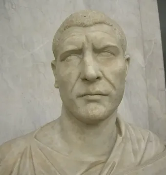 White marble bust of Philip the Arab with short textured hair and a serious expression.