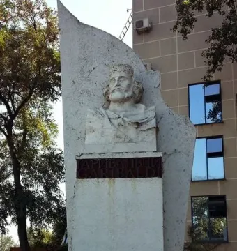 Garibaldi Monument with a bust of a bearded man and a plaque reading GARIBALDI.