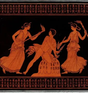 Omphalos in a red-figure pottery scene, shown as a cone-shaped object with patterned markings and a seated male figure on top.