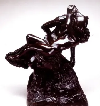 Triumphant Youth bronze sculpture showing two muscular male figures intertwined, one draped across the other\'s back and shoulders.