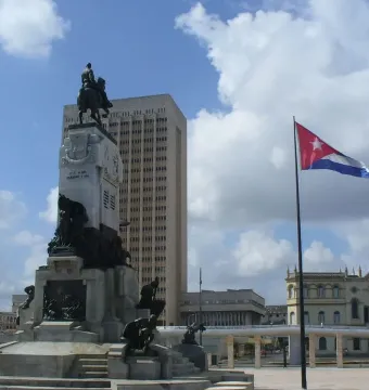 Antonio Maceo Monument with a bronze equestrian statue atop a decorated stone base and reliefs.
