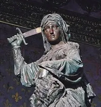 Donatello’s Judith and Holofernes bronze sculpture, showing a woman holding a sword above a bearded male figure.