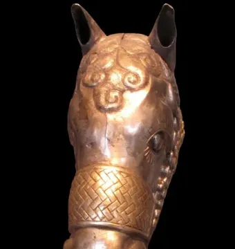 Sassanian Horse Head sculpture with silver metal and gold-gilded details.