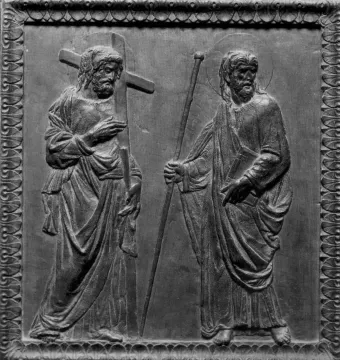 Bronze relief panel from Donatello’s Door of the Apostles showing two bearded robed figures, one holding a cross and the other a staff and book.