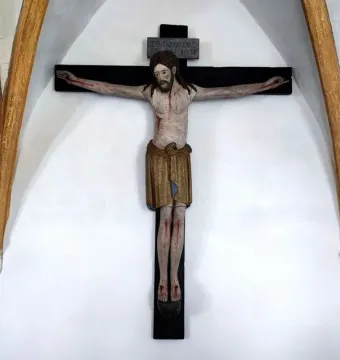 Enghausen Cross wooden crucifix with a pale carved figure of Christ on a black cross
