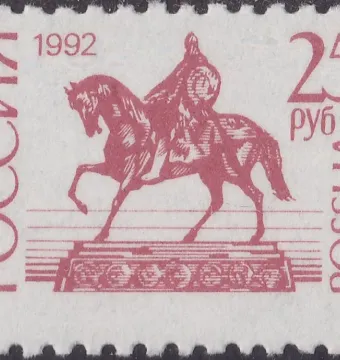 Monument to Yuri Dolgorukiy shown as an equestrian statue on a tiered pedestal.