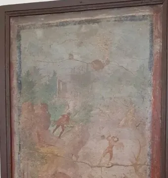 Faded fresco depicting Athena and Marsyas among rocks and sparse foliage.