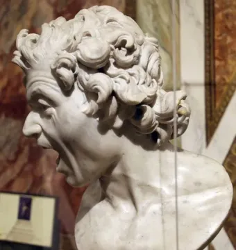 Damned Soul marble bust with a screaming face and furrowed brow