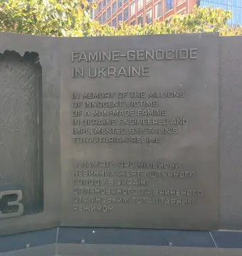 Holodomor Memorial wall with engraved inscription reading \