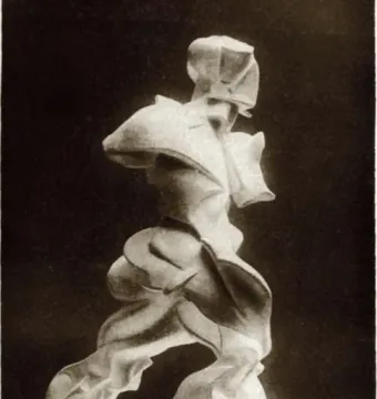 Unique Forms of Continuity in Space sculpture showing a stylized human figure striding forward in sweeping, continuous forms.