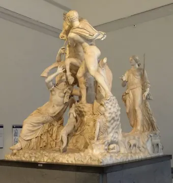 Farnese Bull marble sculpture showing Dirke tied to a bull, with two men and other figures around the dramatic scene.