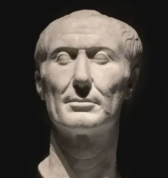 Tusculum portrait marble bust of Julius Caesar with a stern expression and weathered facial features