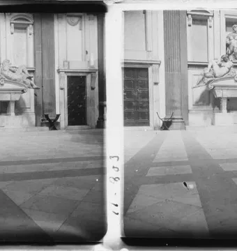 Tomb of Giuliano de\' Medici with a seated armored figure above a sarcophagus, flanked by two reclining nude figures.