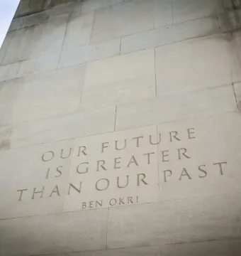 Commonwealth Memorial Gates stone pillar with the inscription “Our future is greater than our past” by Ben Okri.